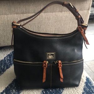 Dooney & Bourke Black Leather zipper bag with front pockets